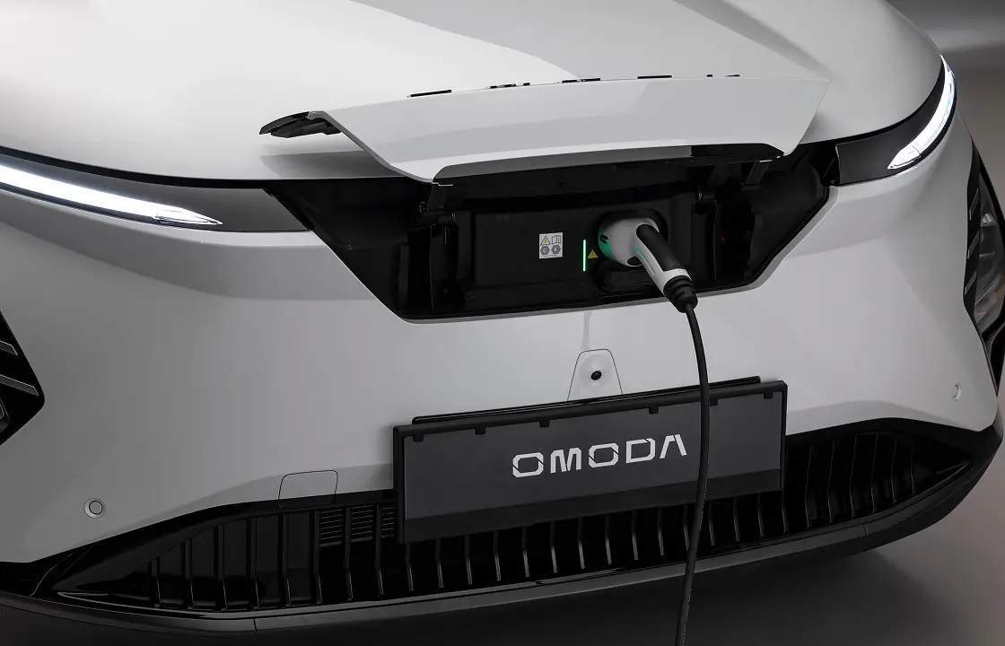 White OMODA being charged