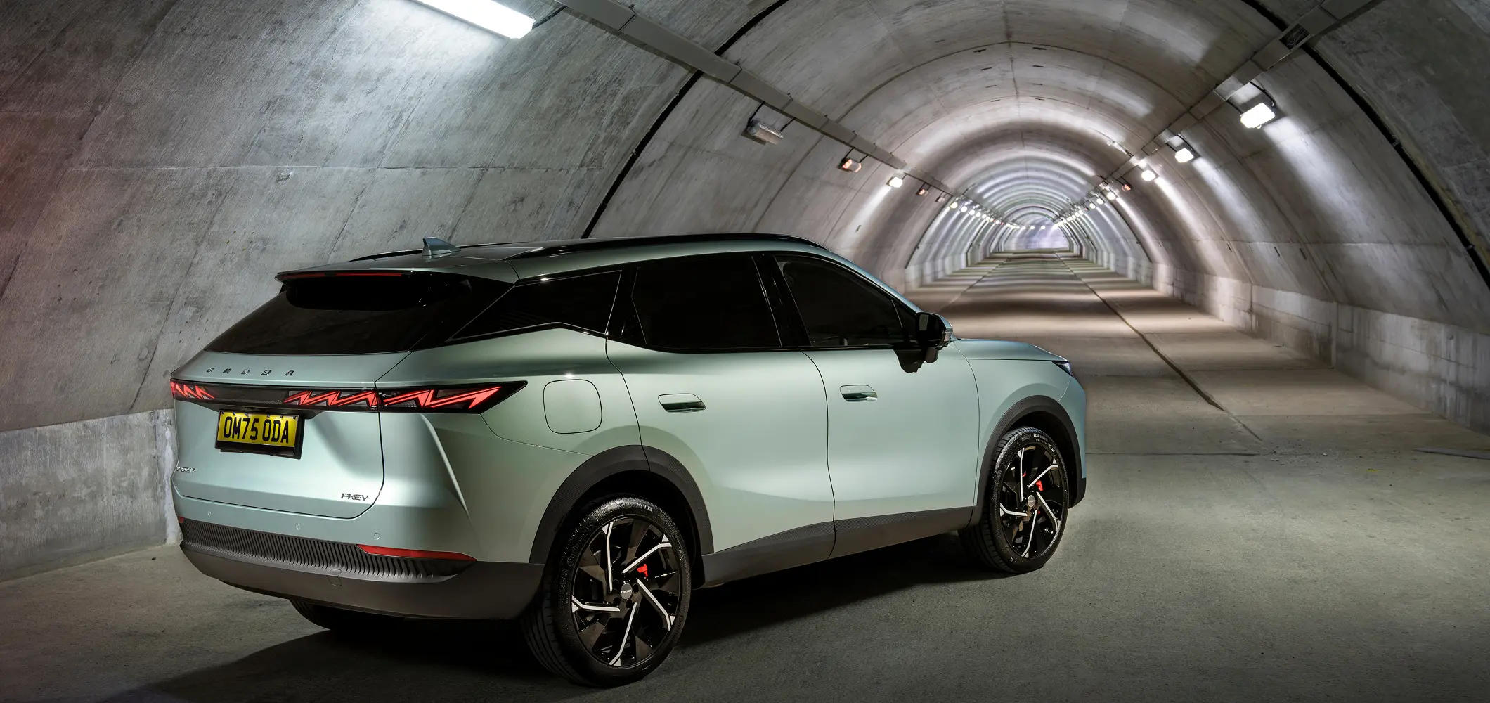 Rear view of the OMODA 7 in a concrete tunnel